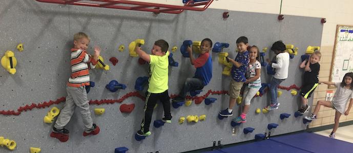 Neff Kindergarten Students Enjoy their new Rock Wall thanks to the PTA